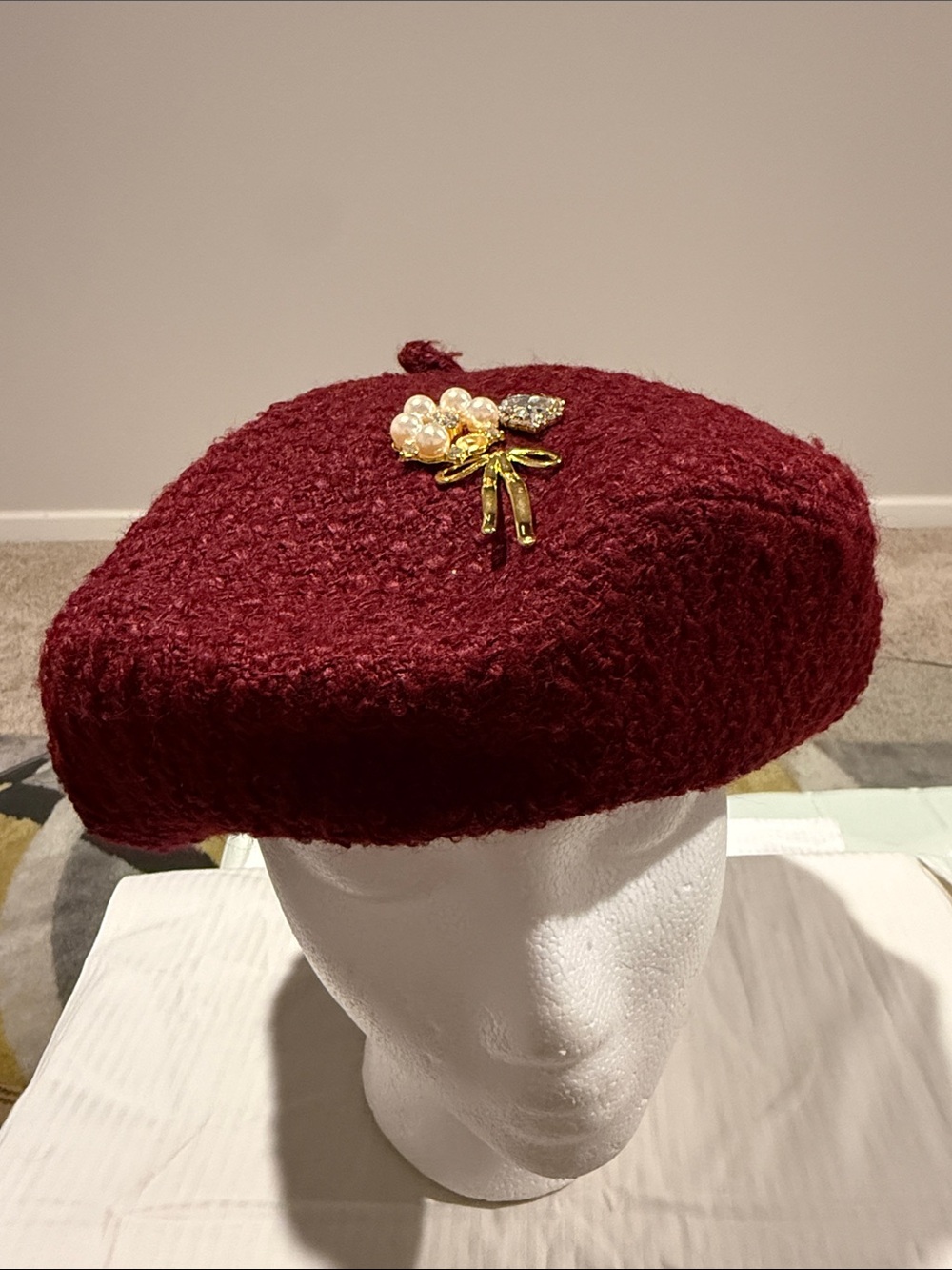 a new day Burgundy Textured Beret with Gold Floral Pin
